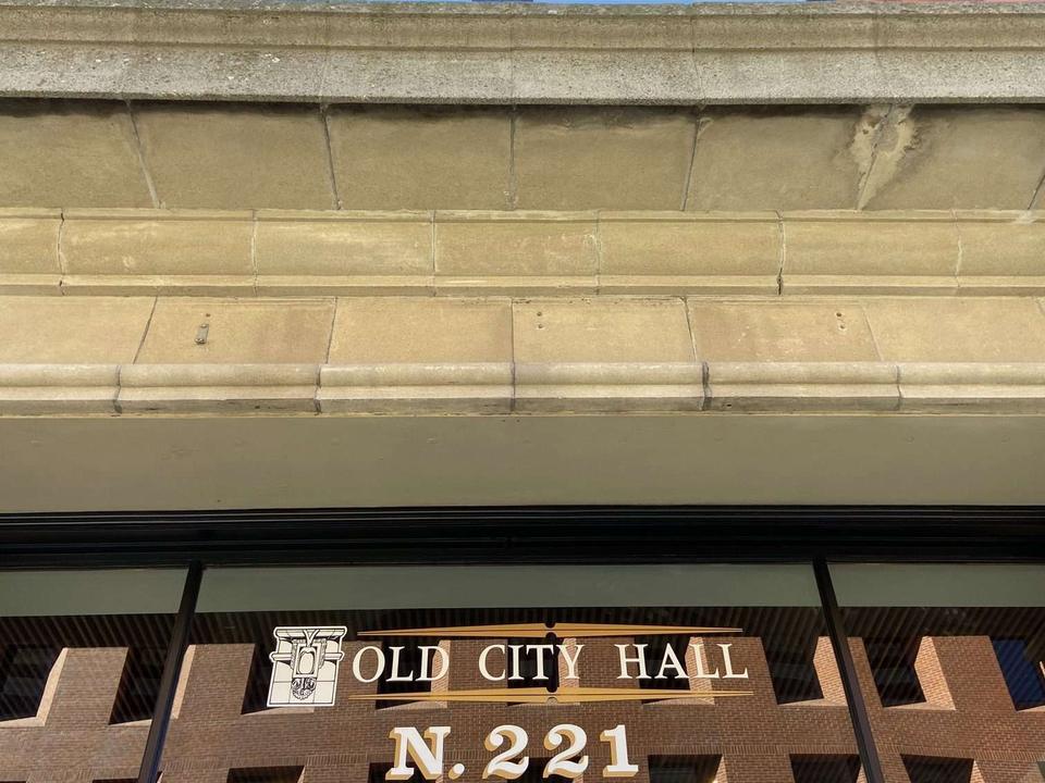 The Old City Hall sign above the studio entrance